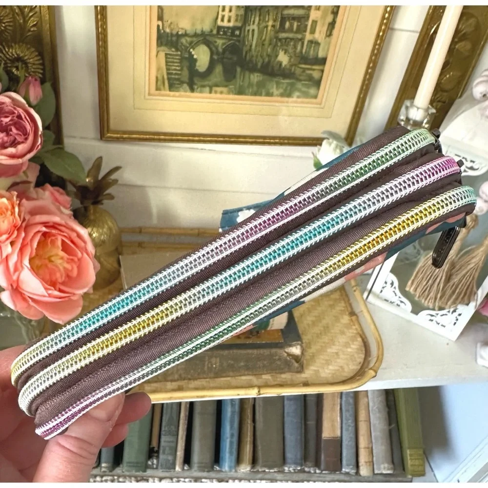 Floral-printed nylon wristlet wallet with three zippered compartments
